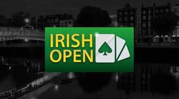 Loggan för Irish Open framför en svartvit stadsbild